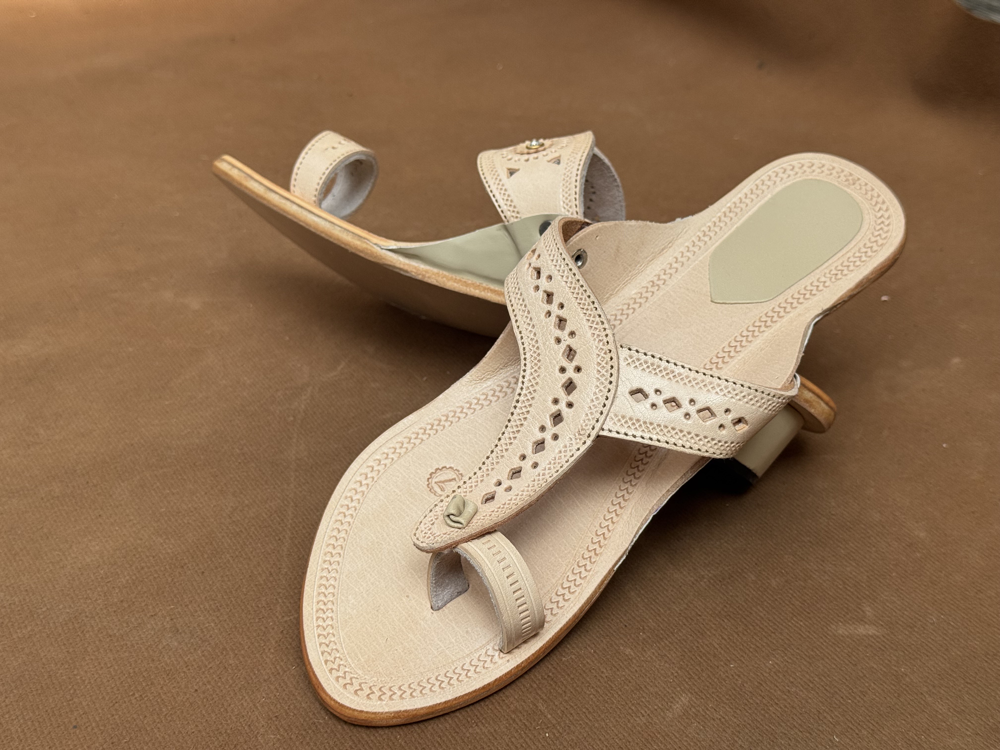 Cross strap leather chappal in natural tan tone